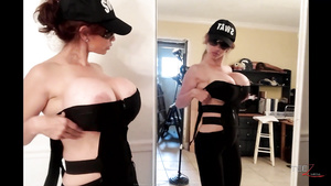 Glamour wife shows her gigantic fake breasts