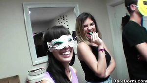 Teen chicks in masks are being hotly fucked in doggy pose at dorm
