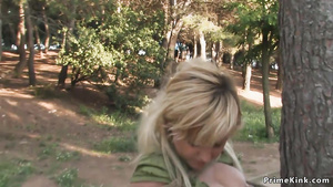 Tied up big bust Spanish blond hair babe on the beach