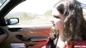Dark haired bitch with natural tits pleasuring Alberto in the car