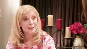 A housewife lesbian Nina Hartley shows a younger one what to do