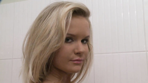 Petite young lesbians play with dildo in their bedroom