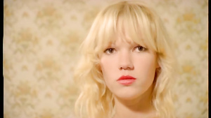 Two stunning blonde babes lick clothed dude’s dick at once