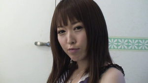 Cute Japanese babe getting ready in the dressing room