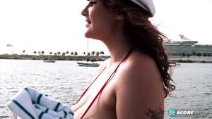 Chubby babe with big tits masturbates on the yacht