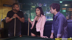 Two studs sandwich a hottie right on the billiards table