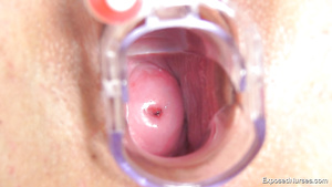 Toys and medical tools inside a wide-open brunette hole