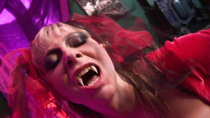 Mature vimpire in red stockings gets anally fucked by human couple