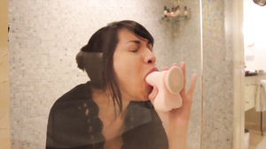 desirable asian cam girl loves banging her dildo in the shower