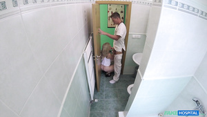 A doctor gets head in the restroom from a sexy young lady. Pt.2