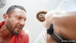 Curly-haired ebony with fake boobs shares hard knob with her bestie