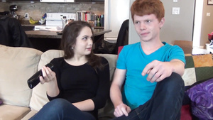 Experienced brunette gives lad a sex lesson on the couch