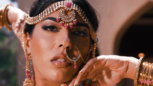 In the moonlit waters' embrace, Jasmine Sherni awakens sensual passions with graceful allure.