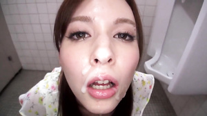 Petite Asian babe comes to the public toilet to blow a cock