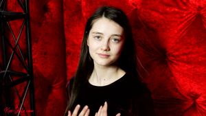 Pretty teen brunette Alisa A in solo striptease scene